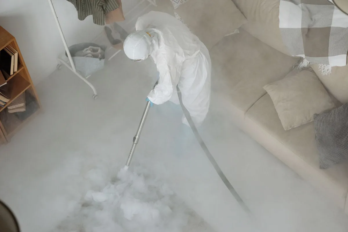 Biohazard cleanup technician in protective equipment, Lincoln Creek, Milwaukee, WI